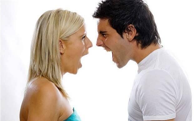 A man and woman shouting each other 