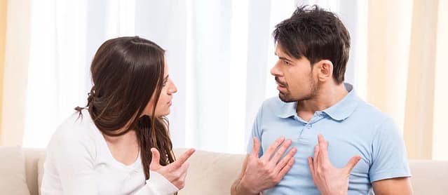 A man asking to a woman what is his fault